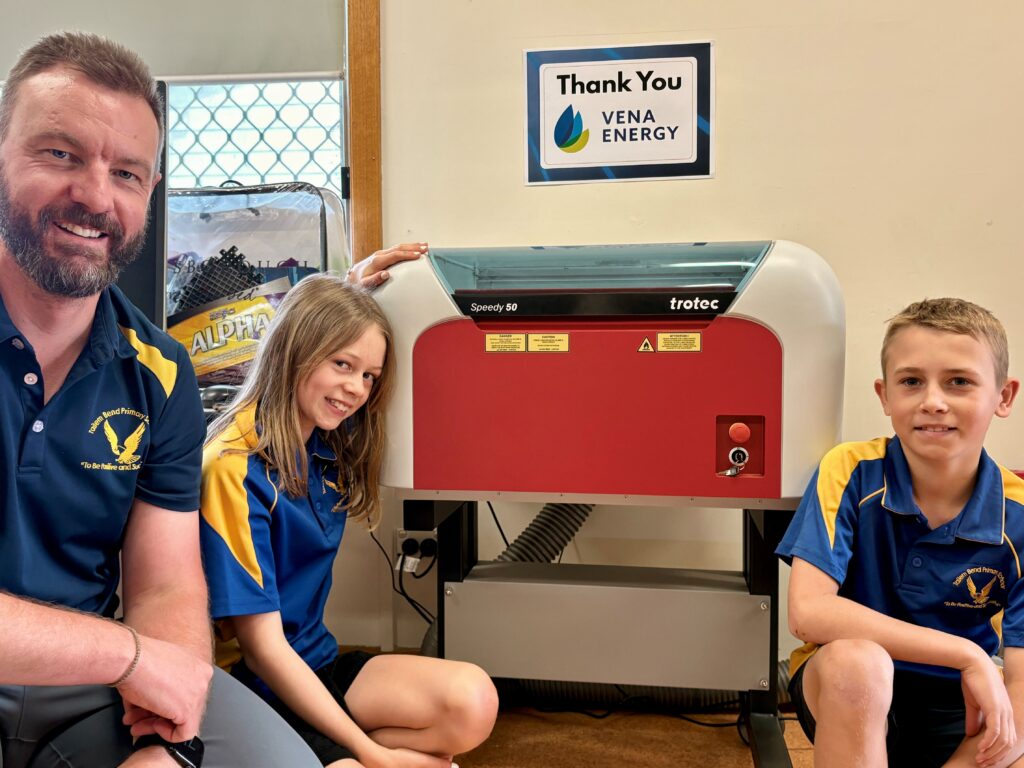 Tailem Bend Primary School Principal and students with their new laser cutter.