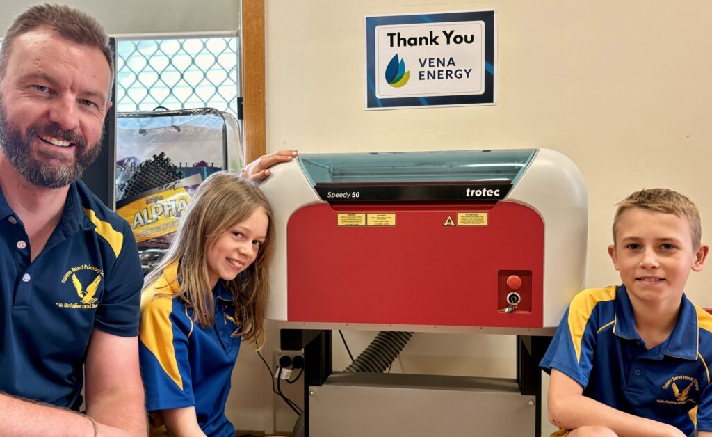 Tailem Bend Primary School Principal and students with their new laser cutter.